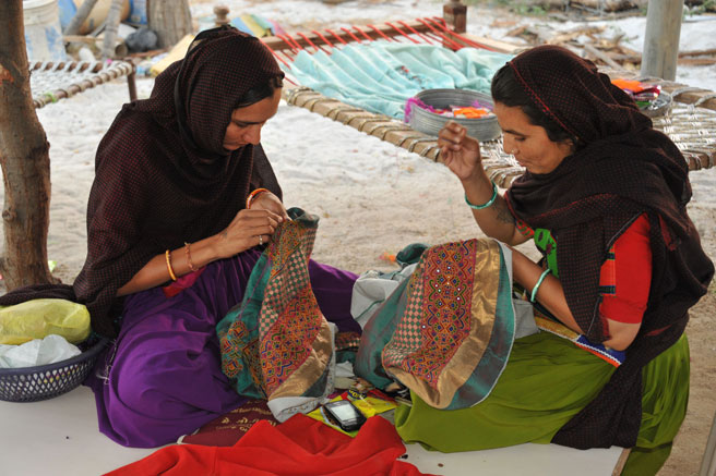 Ahir ladies embroidering at their home